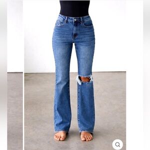 THE LEGS FOR DAYS HIGH RISE FLARE JEANS IN DARK WASH